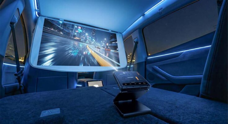 Luxury car interior with projector and screen